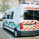 british-ambulance-parked-parking-lot_53876-63437